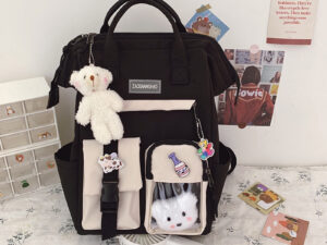 กระเป๋านักเรียนระดับกลางของผู้หญิง สีดำ กระเป๋าเป้ Ins สไตล์เกาหลีความจุขนาด ใหญ่ลำลองสำหรับนักเรียน